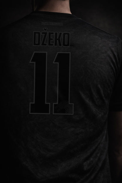Black sports jersey with 'Džeko' and number '11' on the back