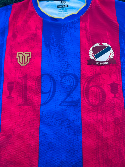 Close-up of a Borac Banja Luka concept red and blue sports jersey with logos and text.